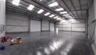  LOCAL D'ACTIVITES ENTREPOT NEUF 400 m² GUIDEL