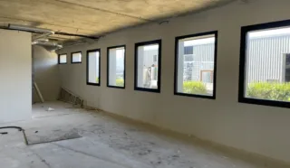  BUREAUX 328 m² LE RHEU