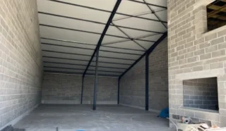  LOCAL D'ACTIVITES 225 M² QUESSOY