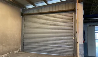  LOCAL D'ACTIVITES OU DE STOCKAGE QUEVERT 300 m²